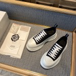 Alexander McQueen Tread Slick Lace up Sneakers Black / White