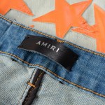 Amiri x Chemist leather stars jeans orange