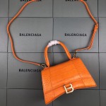 Balenciaga Women's Hourglass Xs Handbag in Orange