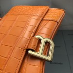 Balenciaga Women's Hourglass Xs Handbag in Orange