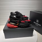 Balmain neoprene and leather Unicorn low-top sneakers Black / Red