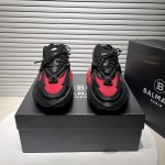 Balmain neoprene and leather Unicorn low-top sneakers Black / Red