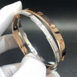 Cartier 18K Gold and White Gold Diamond Paved Love Bracelet 