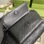 Gucci GG embossed belt bag black 645093