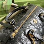 Gucci GG matelassé leather top handle bag black ‎702242