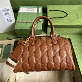 Gucci GG matelassé leather top handle bag brown ‎702242