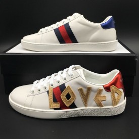 Gucci Men's Ace embroidered sneaker with Loved applique