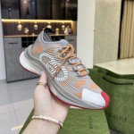 Gucci Run sneaker Grey and orange GG technical knit fabric