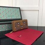 Disney x Gucci zip around wallet