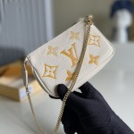 LV Monogram Empreinte Mini Pochette Accessoires Bag M80502