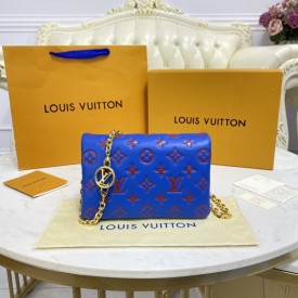 LV Monogram Embossed Pochette Coussin Blue M80743