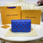 LV Monogram Embossed Pochette Coussin Blue M80743