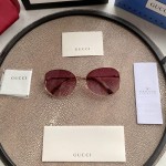 Gucci Oval Metal Sunglasses Blue