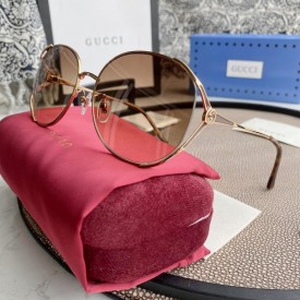 Gucci Oval Metal Sunglasses Brown