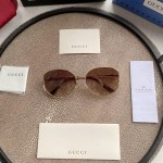 Gucci Oval Metal Sunglasses Brown