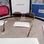 Gucci Oval Metal Sunglasses Brown