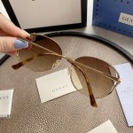 Gucci Oval Metal Sunglasses Brown