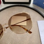 Gucci Oval Metal Sunglasses Brown