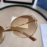 Gucci Oval Metal Sunglasses Brown