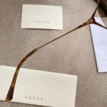 Gucci Oval Metal Sunglasses Brown