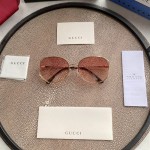 Gucci Oval Metal Sunglasses Pink