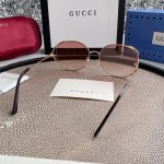 Gucci Oval Metal Sunglasses Pink