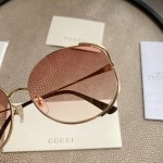 Gucci Oval Metal Sunglasses Pink