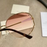 Gucci Oval Metal Sunglasses Pink