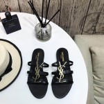 YSL Cassandra Flat Sandals in Patent Leather Black / Gold