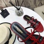 YSL Cassandra Flat Sandals in Patent Leather Red