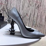 YSL opyum pump in patent leather with black heel silver