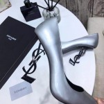 YSL opyum pump in patent leather with black heel silver