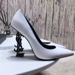 YSL opyum pump in patent leather with black heel white