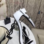 YSL opyum sandals in patent leather with black heel white